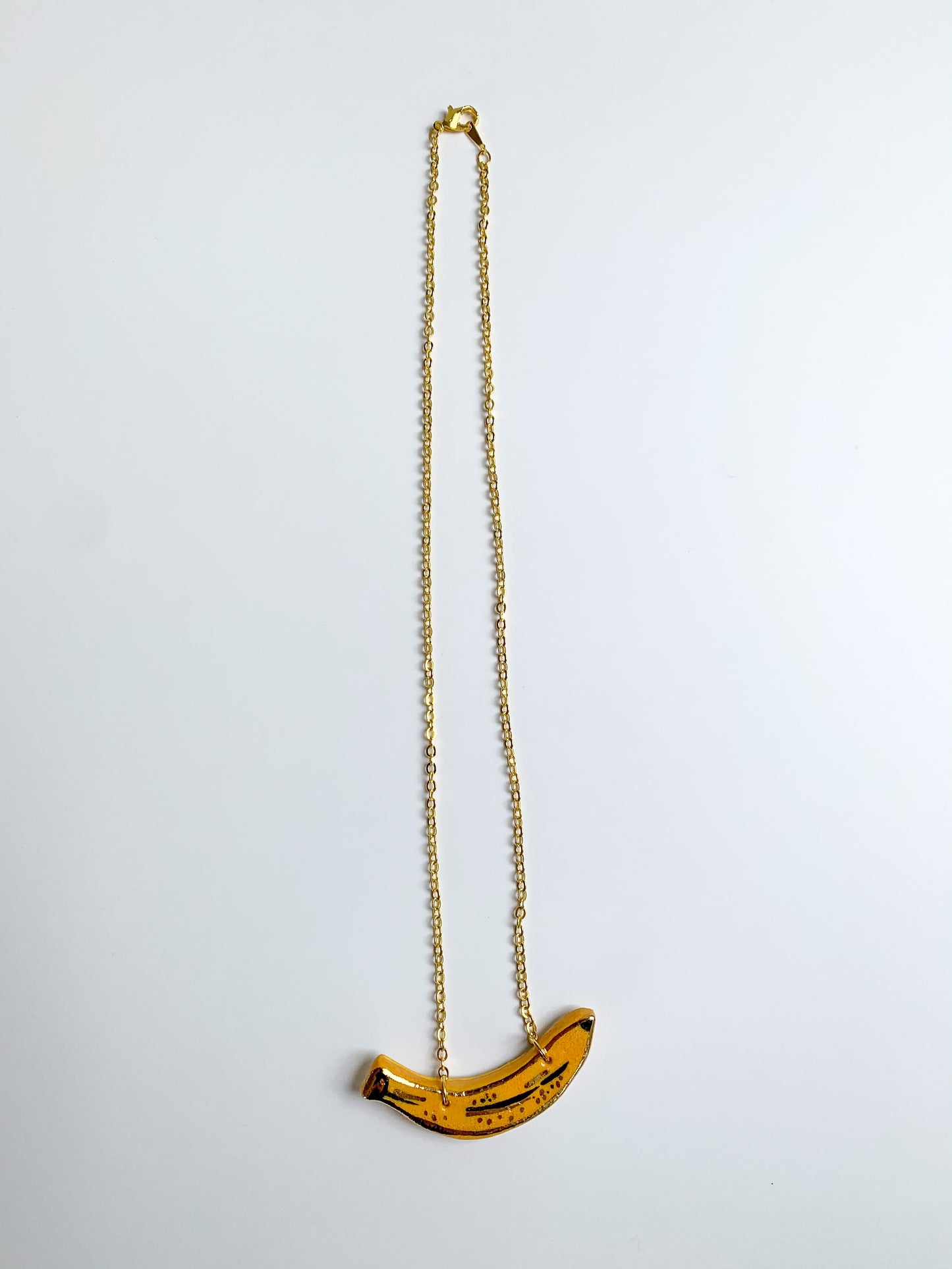 top banana ceramic necklace